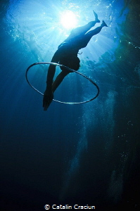 Freediving through the bubble rings . Taken in Coron usin... by Catalin Craciun 
